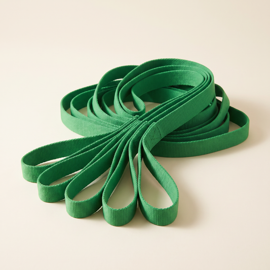 TrueSelf stretching strap gathered into a compact pile with the loops fanned out
