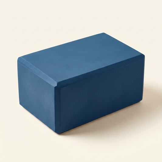 TrueSelf EVA foam yoga block in indigo, three-quarter view